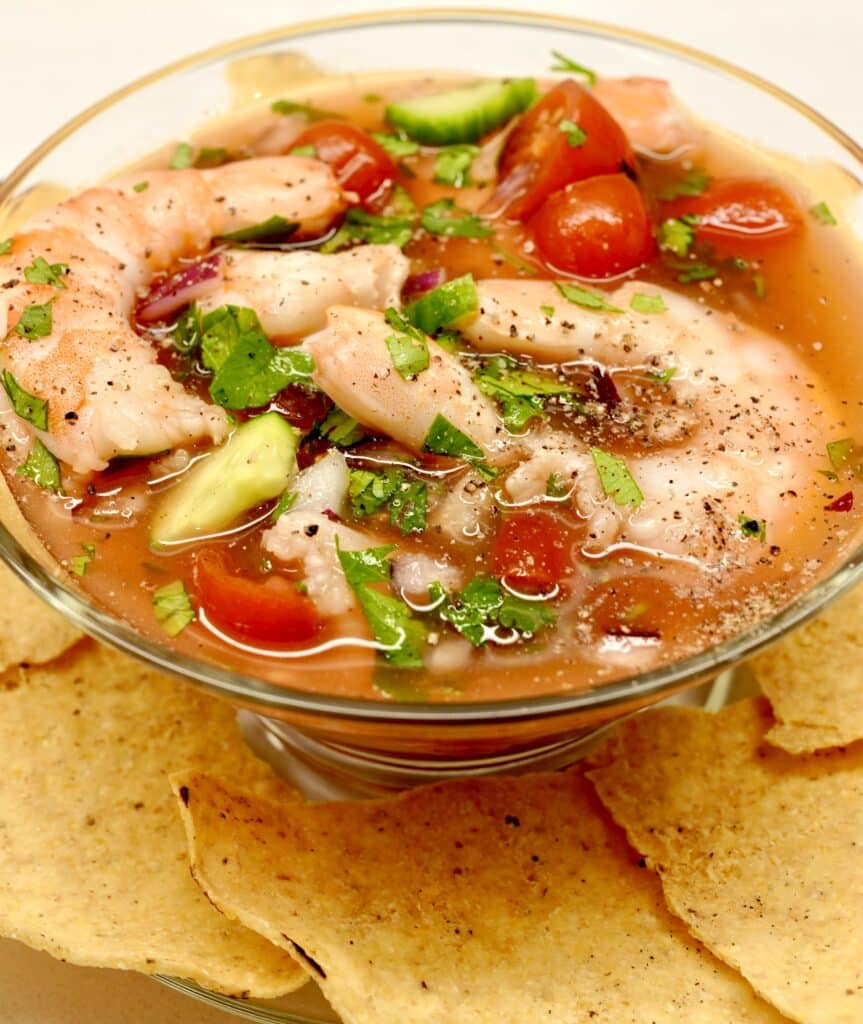 Shrimp cocktail in a glass, served with tortilla chips