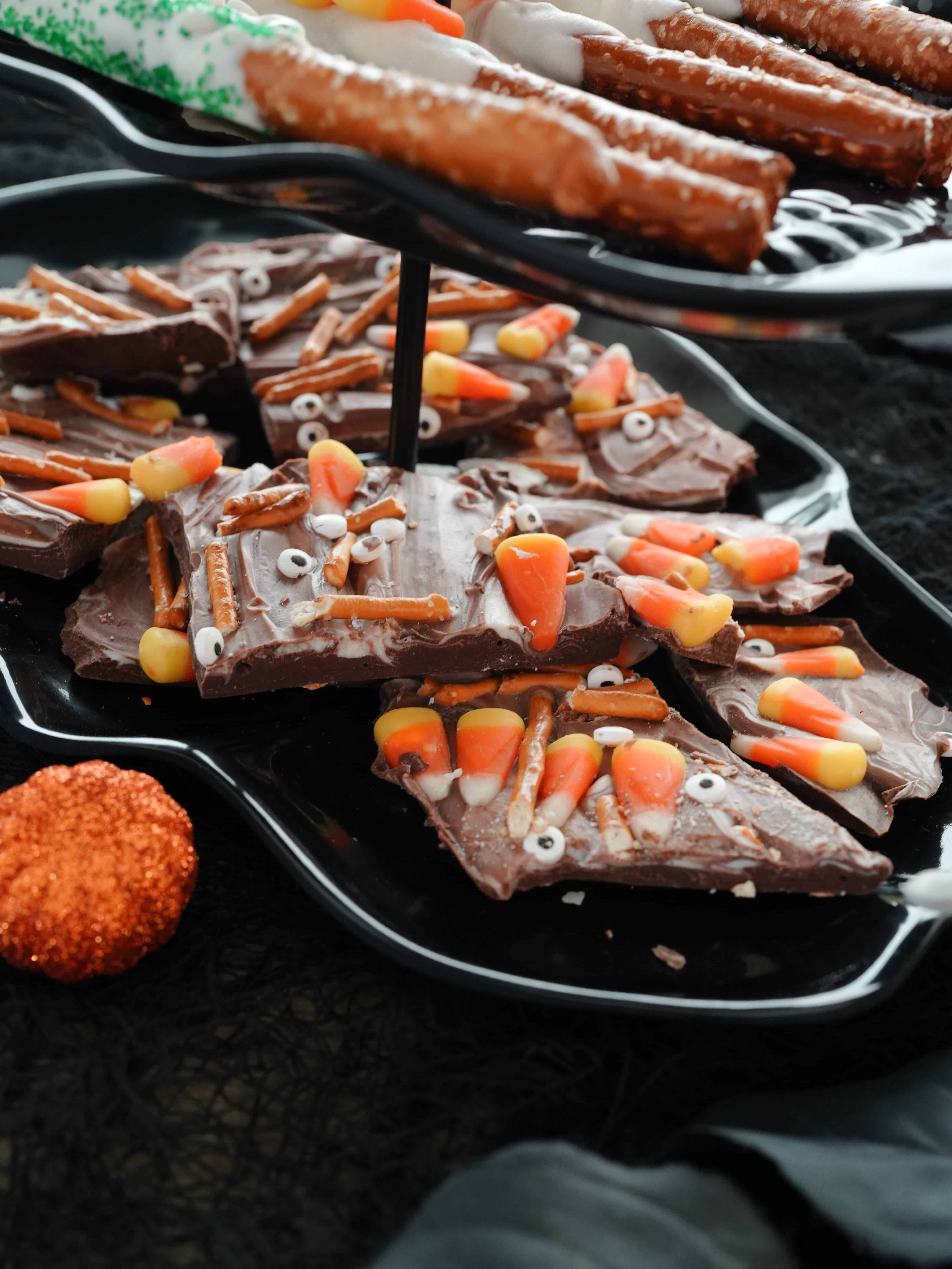 Halloween chocolate bark on skull shaped black serving board