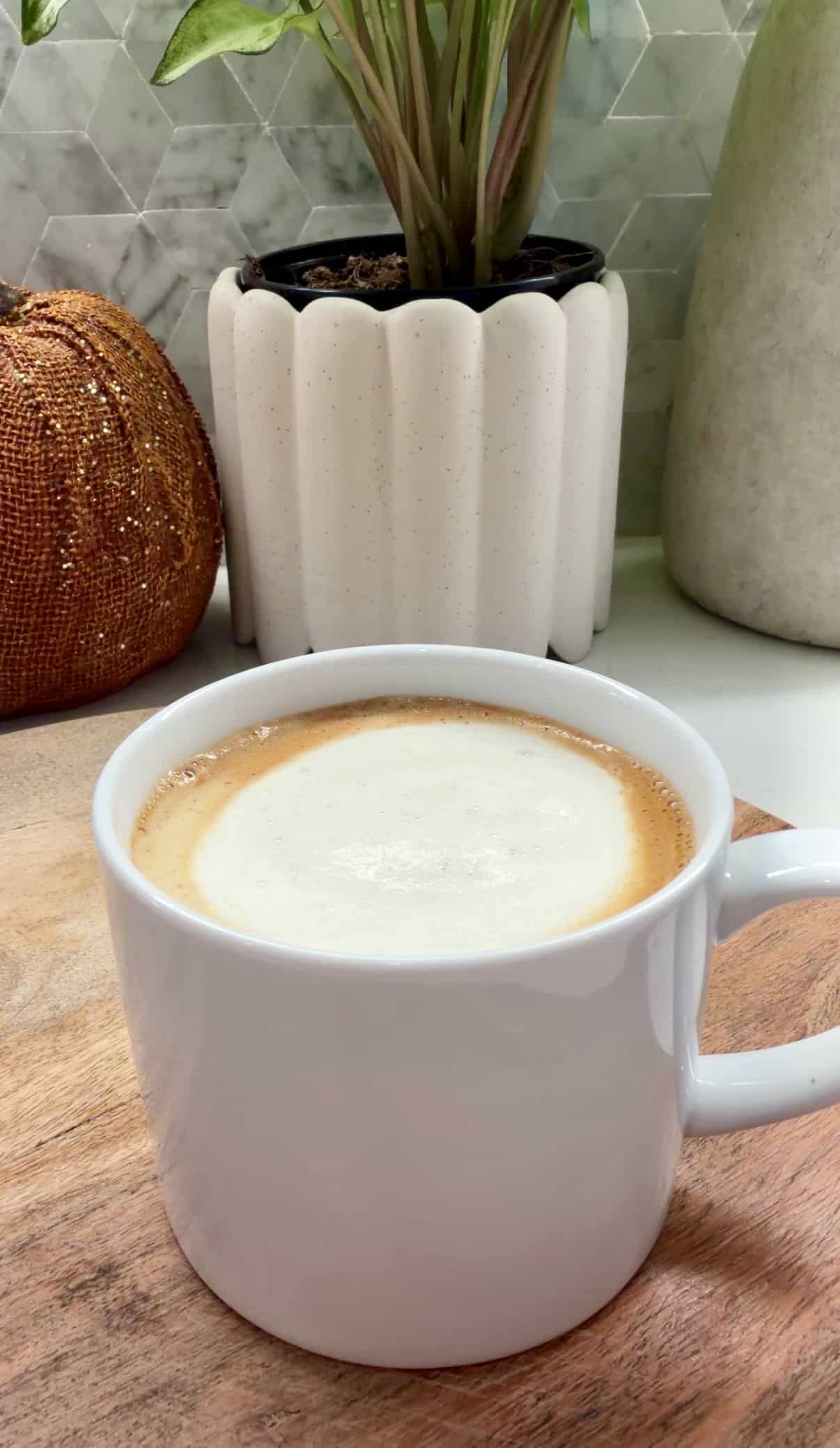 Latte in white mug